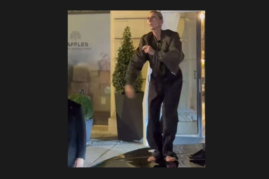 Celine Dion baila descalza sobre un auto frente a su hotel en París